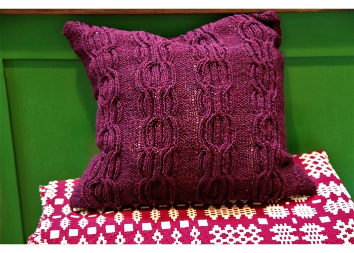 Hand knitted pure wool cushion. Blackberry Chain